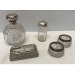 A silver topped cut glass scent bottle 12.5cm h W and H Birmingham, a silver lidded jar 8.5cm h