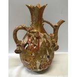 Late Meiji period Satsuma wine ewer, gilt decoration with figures 27cm h x 32cm w and signed to
