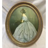 Oval gilt framed print. Portrait of a lady in a blue dress. Print size 39cm x 49cm.Condition