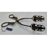 A pair of decorative Continental white metal tongs marked .800. 48.7gms.Condition ReportGood