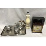 Picquot three piece tea set on steel tray, an onyx table lamp 33cm h and a Metamec chiming mantle