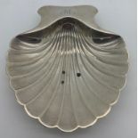 A Tiffany & Co scallop shaped bon bon dish. 13.5cms x 11.5cms. 136.2gms.Condition ReportMarks to