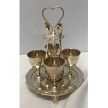Hallmarked silver egg stand, four egg cups with spoons. H.A Sheffield 1951. 537gms.Condition