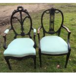 Two late 19thC carved balloon backed armchairs with floral carving. Height to seat 45cm, height to