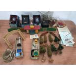A selection of model railway accessories to include Hornby transformers, speed controllers, wooden