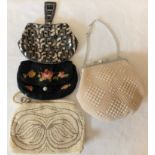 Four vintage beaded evening bags.Condition ReportBlack bag with loose thread. Others in good