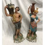 Pair of Capodimonte tall figurines signed G Pellati, lady with water jug and man with basket of