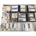 Five albums of First Day Cover stamps, a selection of loose First Day Cover envelopes, some loose