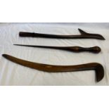 A good quality vintage Fijian hardwood gunstock club together with 2 tribal throwing/fighting