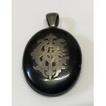 Whitby Jet and Silver pendant locket, hallmarked London 1877 Cornelius Saunders and Frank