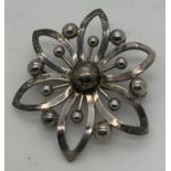 A Sterling silver brooch by maker John L. (Lauritzen) Denmark. 4cms d.Condition ReportGood