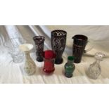 A collection of glassware to include a ruby cut glass large jug 24cm h, large vase 28cm h and