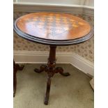 A 19thC mahogany tripod table with inlaid games board to top. 54 d x 70cms h.Condition