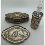 Hallmarked silver to include a lidded box with repouse decoration and vacant cartouches,