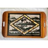 A heavy wooden tray from Rio de Janeiro inlaid with butterfly wings. 64cm x 39cm.Condition ReportA