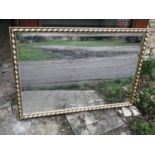 Gilt framed bevel edged wall mirror. 95cm x 66cmCondition ReportLarge mirror chip bottom corner