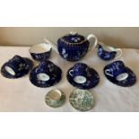 A Copeland part tea set to include a teapot, 4 cups and saucers and sugar bowl together with a