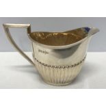 Hallmarked silver jug. Walker and Hall, Sheffield 1898. 196.7gms Height to spout 9.5cm.Condition