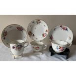 Three early 19thC porcelain floral decorated cups and saucers possibly Swansea.Condition ReportAll