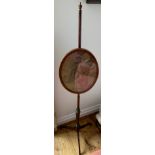 A 19thC mahogany pole screen with woolwork embroidery a/f.Condition ReportEmbroidery a/f, wood