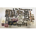 A collection of Victorian and 20thC coins to include British copper and silver penny farthings,