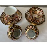 Royal Crown Derby including two cups and saucers and two helmet salts.Condition ReportSlight gilt