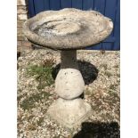 Concrete bird bath with leaf decorated pedestal 72cms h x 46cms d.Condition ReportSome weathering