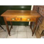 A pine two draw table with turned legs. 91cms w x 44cms d x 77cms h.Condition ReportVery good.
