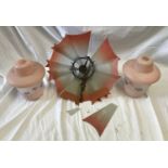 A pair of pink glass ceiling light shades 25cm h and a glass fan ceiling light 42cms w.Condition