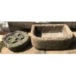 Limestone planter 56cms w x 40cms x l x 19cms h together with a craved circular limestone with cross