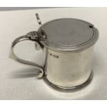 Hallmarked silver mustard pot with blue glass liner. R.C London 1969. Weight without liner 95gms.