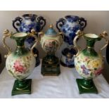 Two pairs of 19thC ceramic vases plus one single twin handled transfer printed vase. Blue and