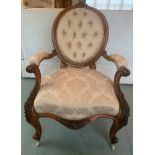 A very good quality 19thC walnut button backed open armchair with scroll arms and cabriole legs on