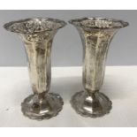 A pair of silver flute vases with pierced tops in an octagonal shape, C. & S. Co. Ltd. London