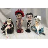 Four Betty Boop figures of a seated Betty 25cms, Red Hat Betty 36cm, black sparkly dress Betty 36cms