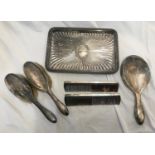 A silver vanity set comprising 2 brushes, 2 combs and a mirror S. J. London 1912 together with a