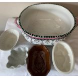Four late 19thC/early 20thC ceramic jelly moulds, a 19thC footbath 53cms x 34cms and an Imari