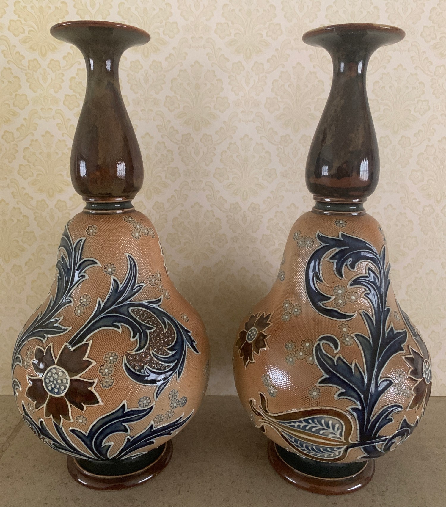 Pair of Doulton Lambeth vases. 27.5cms h.Condition ReportGood condition, no damage or repairs.