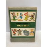 Four Disney books to include Walt Disney's Worlds of Nature, Stories from Other Lands, America and