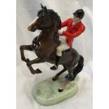 A Beswick Huntsman 868 on rearing horse 23cmsh, base 12.5cms x 9cms.Condition ReportVery good, no