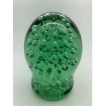 A 19thC green glass Castleford dump. 12cms h.Condition ReportChip to base.