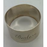 A hallmarked silver napkin ring inscribed "Barbara" by Deakin and Francis Ltd Birmingham 1939. 23.