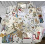 A large quantity of 20thC used British and World stamps, franked envelopes and some postcards.