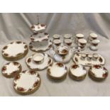 A Royal Albert Old Country Roses Tea and Dinner service set to include a teapot 20cms h, cake stand,