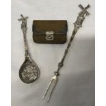 A small leather silver mounted purse D.&I. stamped 925 together with a Netherlands silver spoon