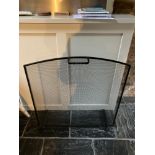 A wrought iron fire screen by David Athey. 79 h x 76 w.Condition ReportGood condition.