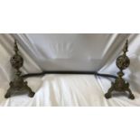 A decorative brass fire front finials with metal bar. Overall width 94cms x 43cms h.Condition