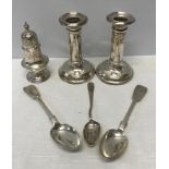 A selection of silverware to include a pepper pot C.S.H. London 1898, a pair of teaspoons J.W. & J.