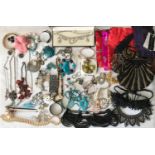 A large collection of modern costume jewellery including necklaces, bracelets, hair pins, small