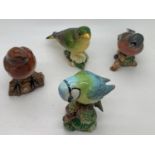 Four Beswick birds to include Blue Tit, Greenfinch, Chaffinch and Robin.Condition ReportGood